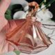 Vintage Art Deco perfume bottle in beautiful pink glass.