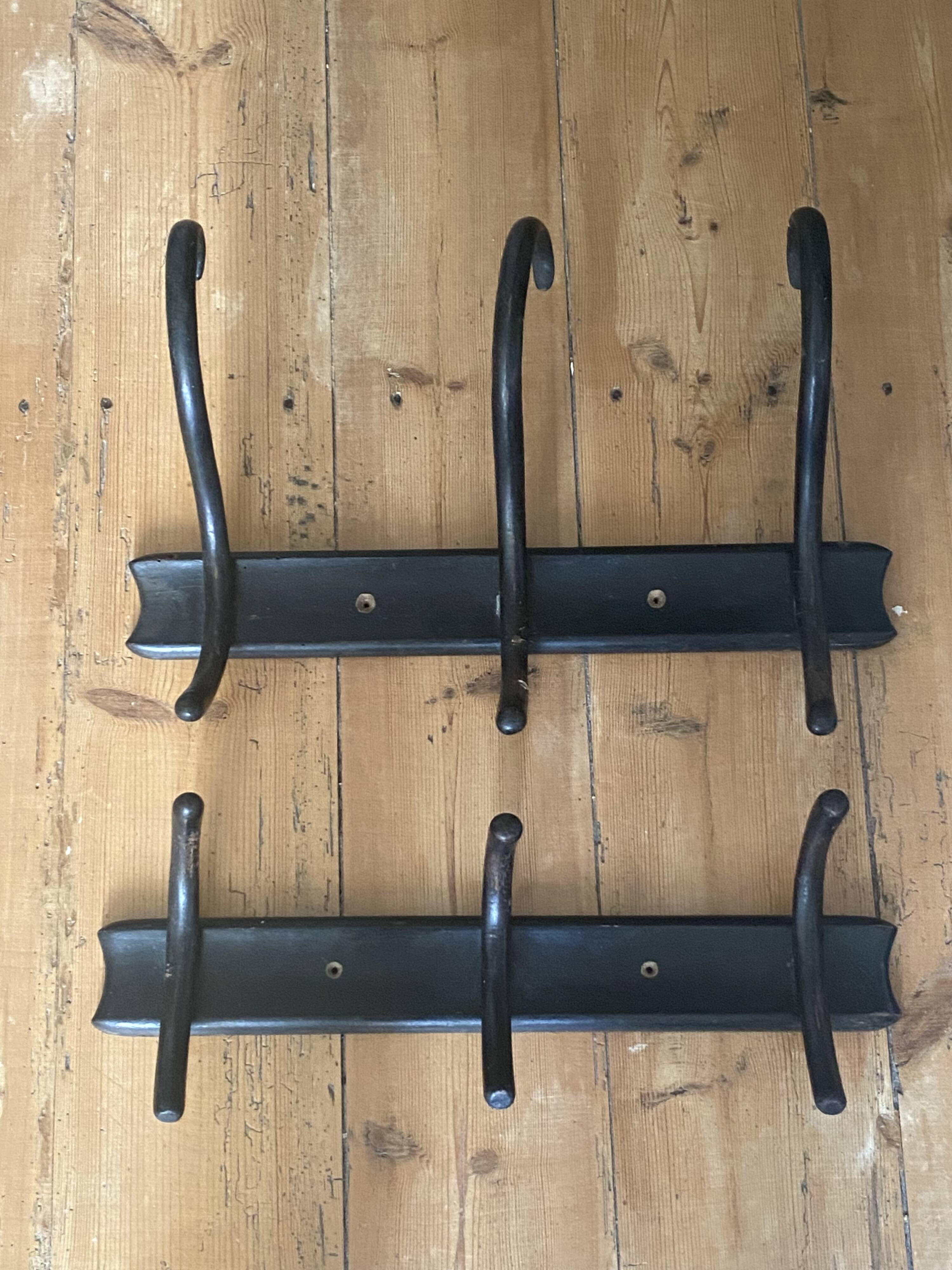 Old black curved wooden coat rack