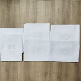 White linen towels embroidered