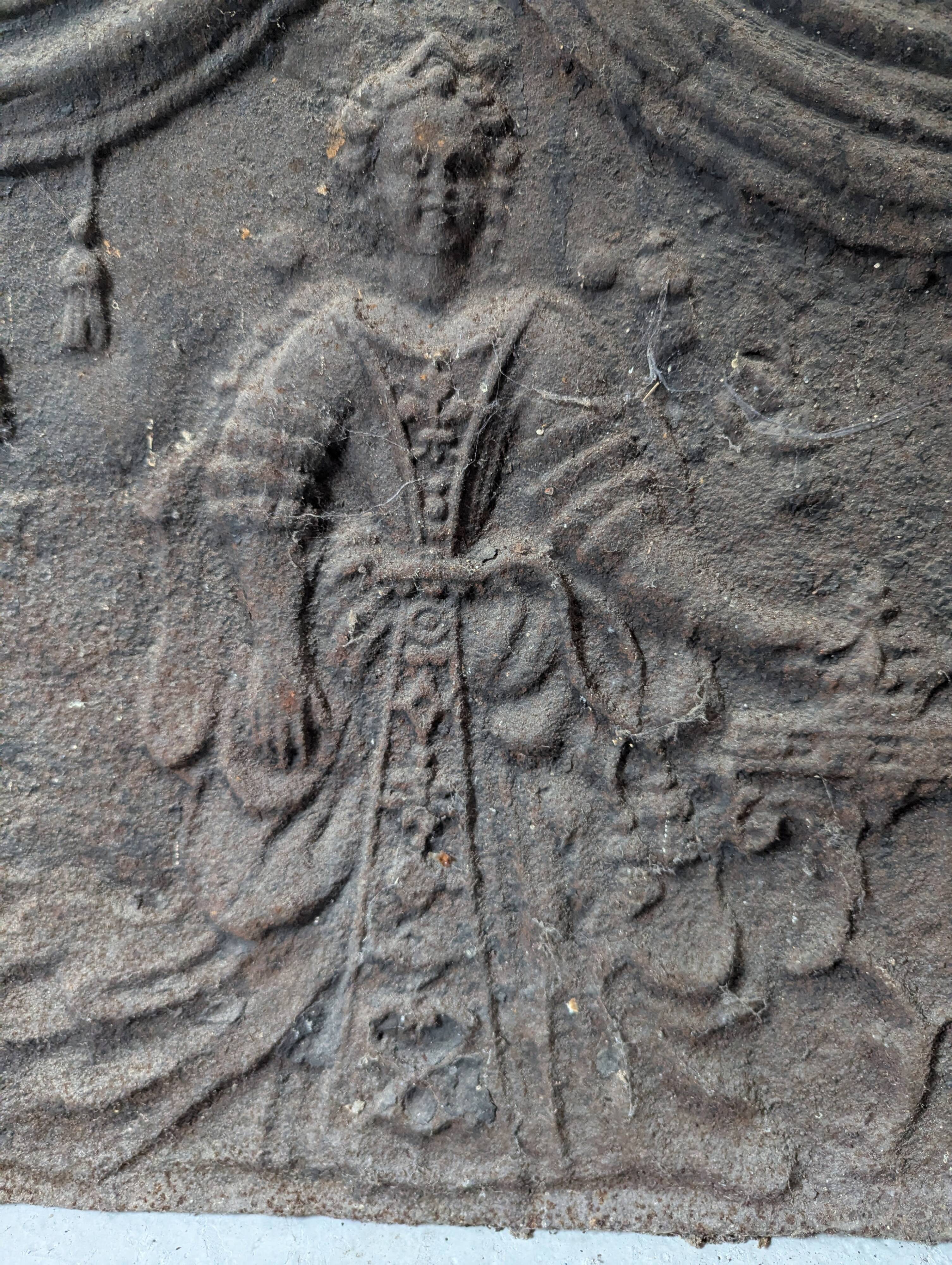 Antique cast iron fireback – baroque female scene