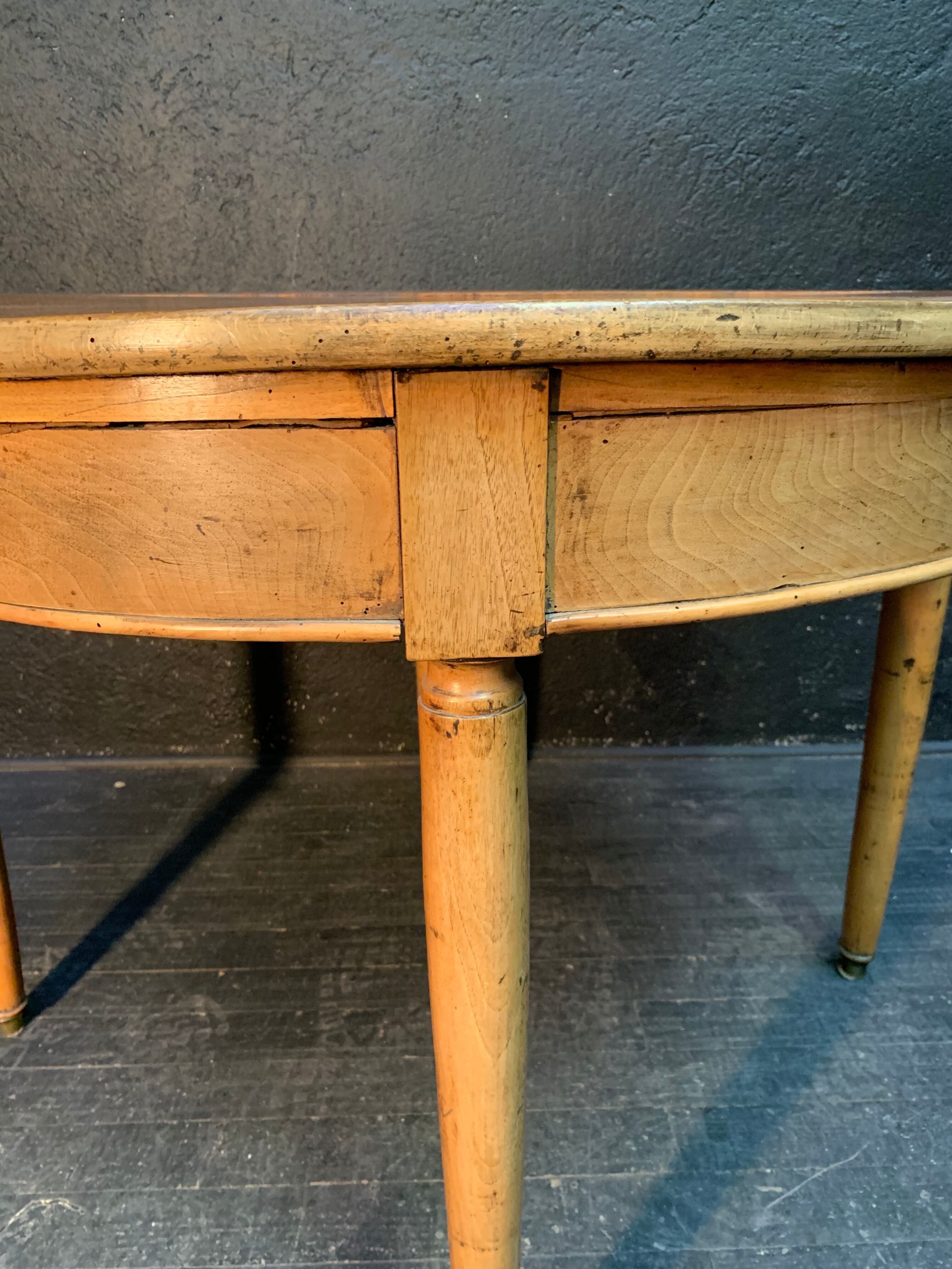 Former Louis XVI-style half moon table 19th century