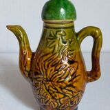 Set of old teapots and honey pot