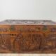 Chinese carved chest made of solid wood — life scenes in bas-relief