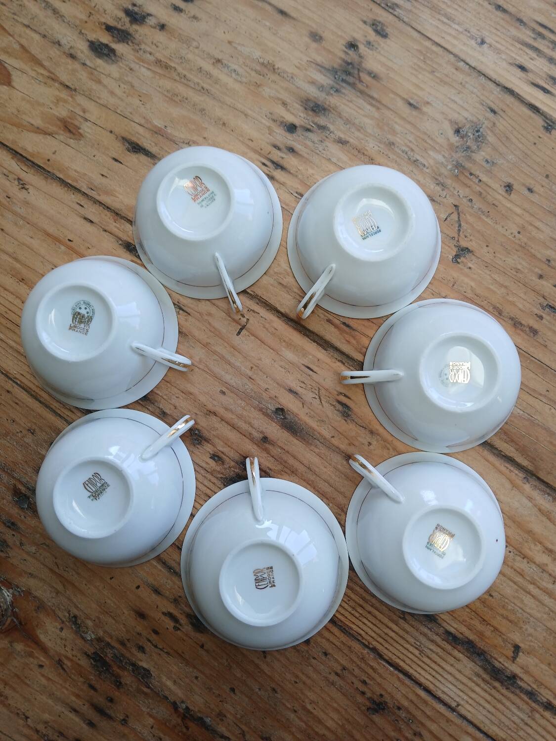 Set of 7 Limoges porcelain cups and saucers