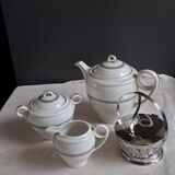 Teapot, sugar bowl, milk jug, jam jar.