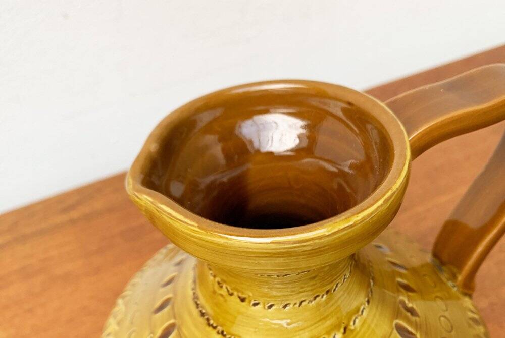 Italian pottery carafe from the mid-century by Aldo Londi for Bitossi, 1960s.