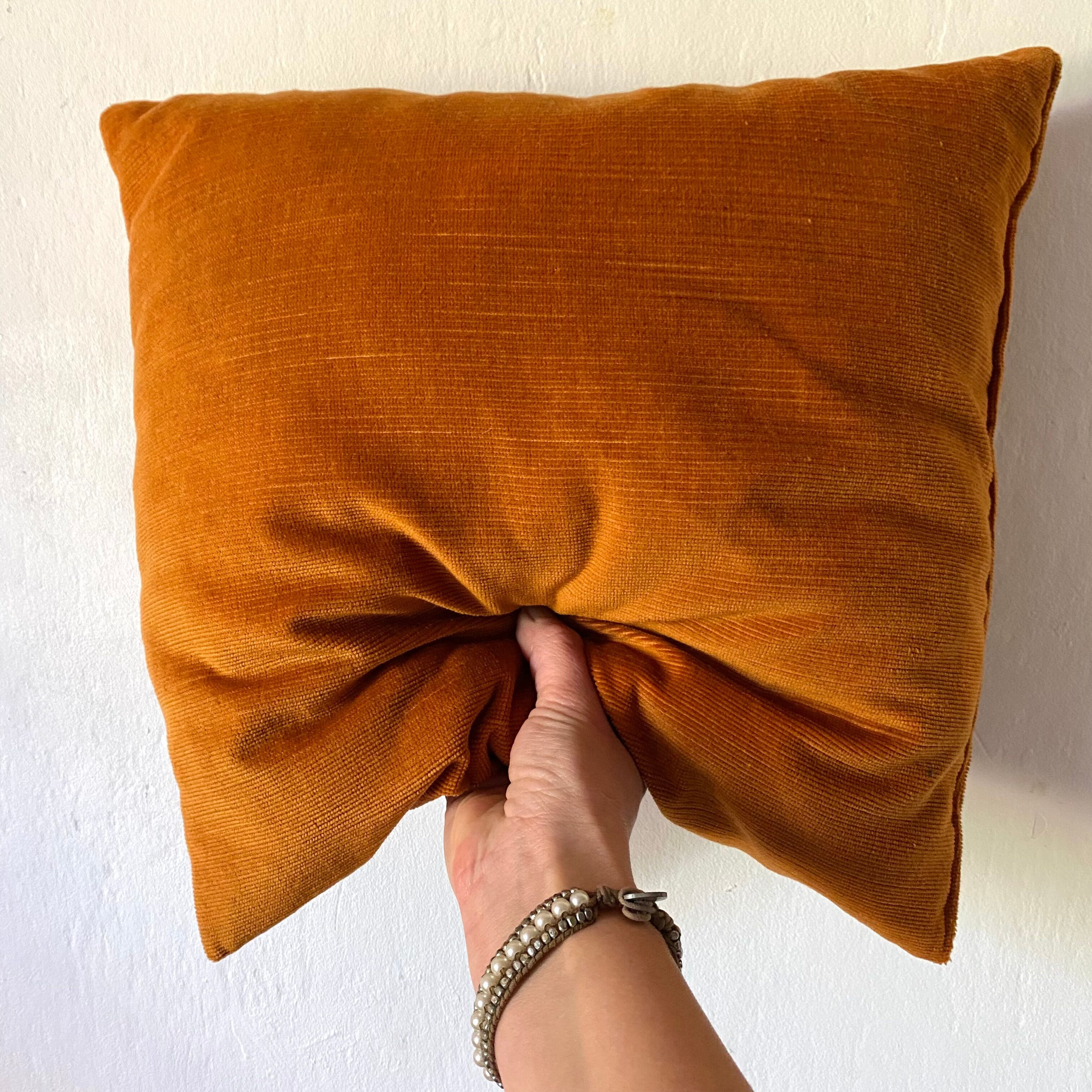 Vintage ochre velvet cushion