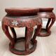 Pair of stools / Chinese side tables in red lacquered wood