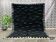 Black handmade wool rug