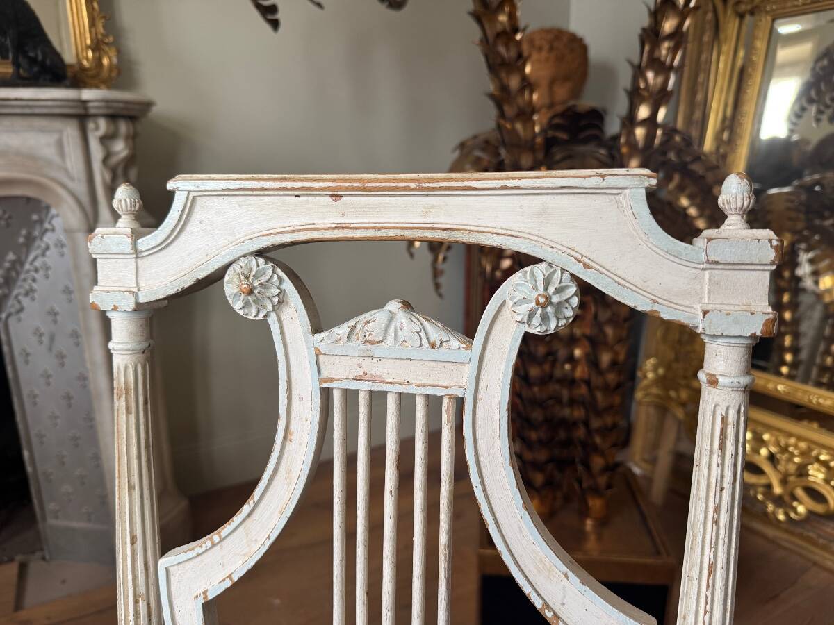 Set of 6 lyre chairs from the Napoleonic III period in painted wood in the Louis XVI style.
