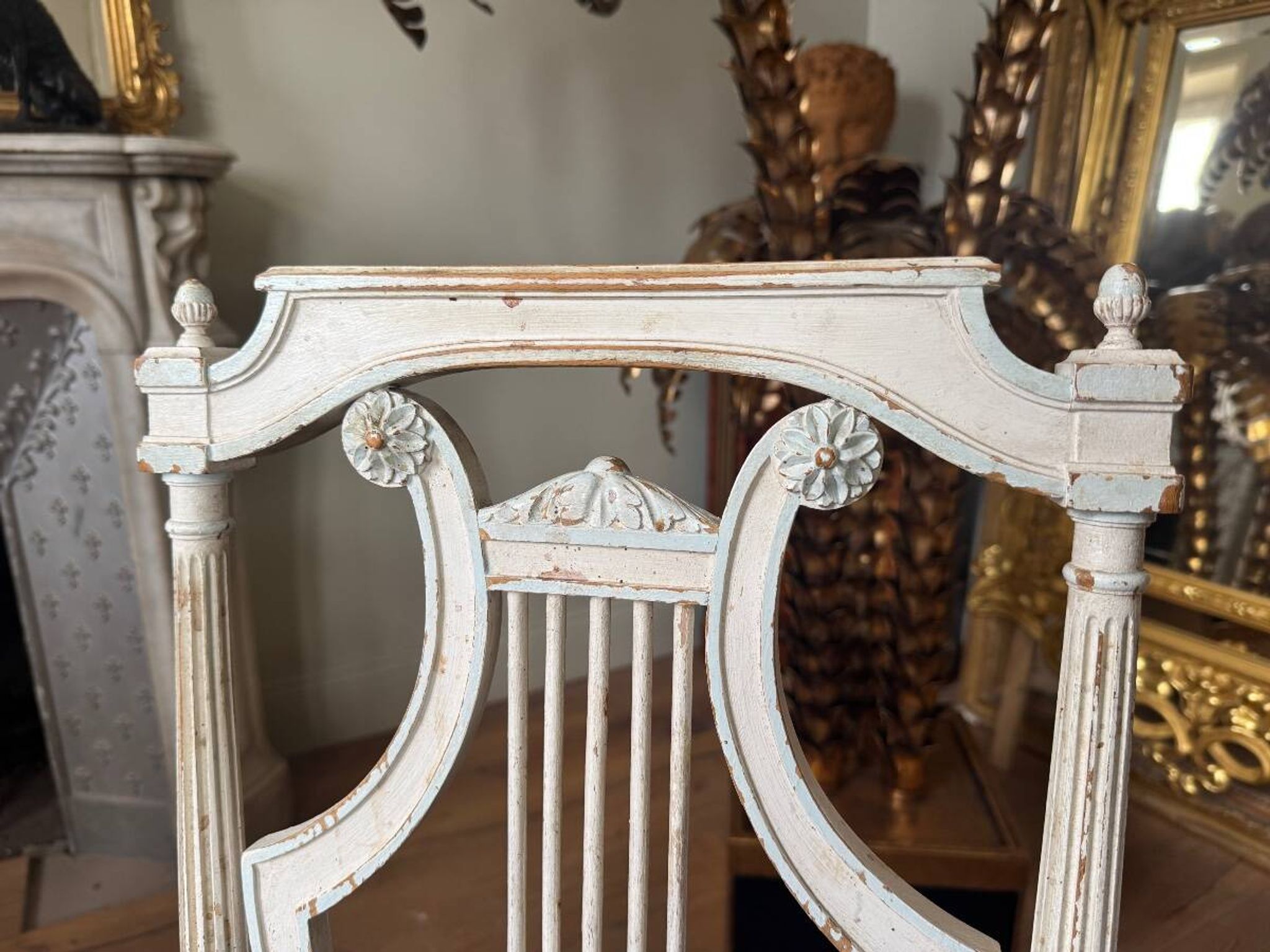Set of 6 lyre chairs from the Napoleonic III period in painted wood in the Louis XVI style.