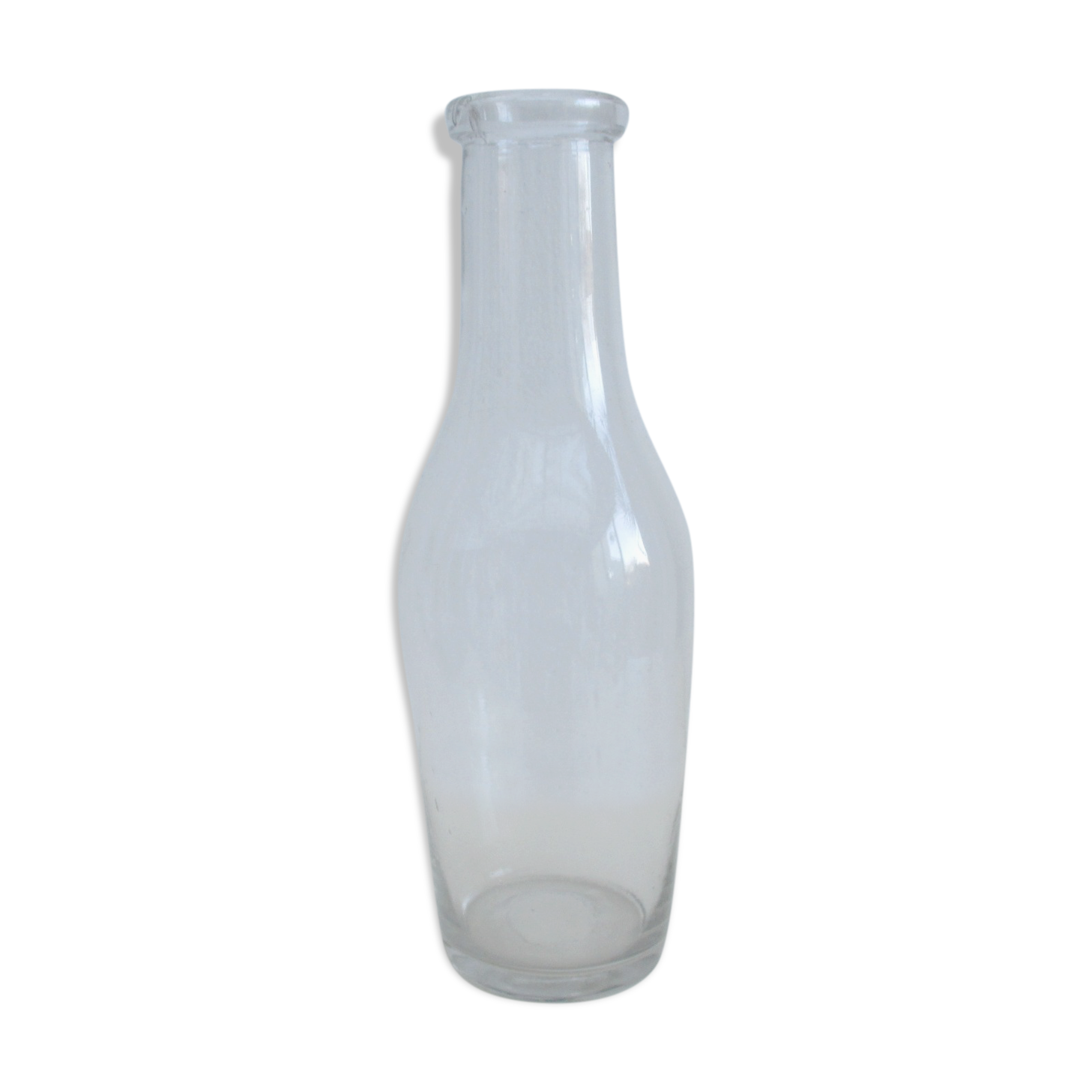 Large antique bottle made of blown glass