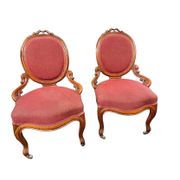 Paire de fauteuils à dossier médaillon ovale de style Napoléon III