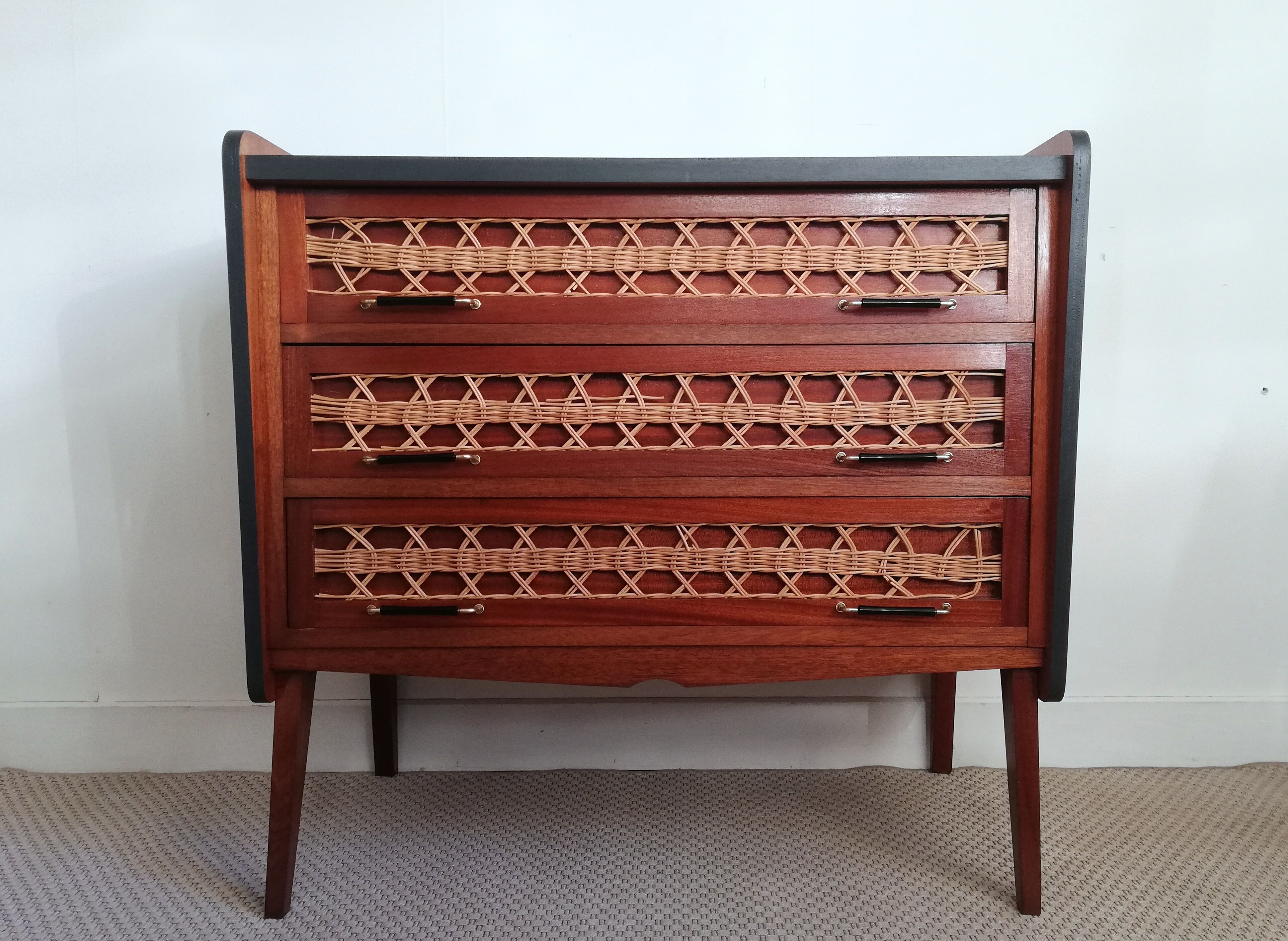 Teak and rattan chest of drawers feet compass