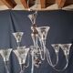 Chandelier from the 1930s to 1950s in chrome metal and thick glass.