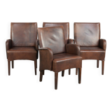 Set of 4 nicely finished dining chairs/side chairs with armrests made of cowhide leather