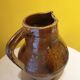 Varnished terracotta pitcher from the 19th century.