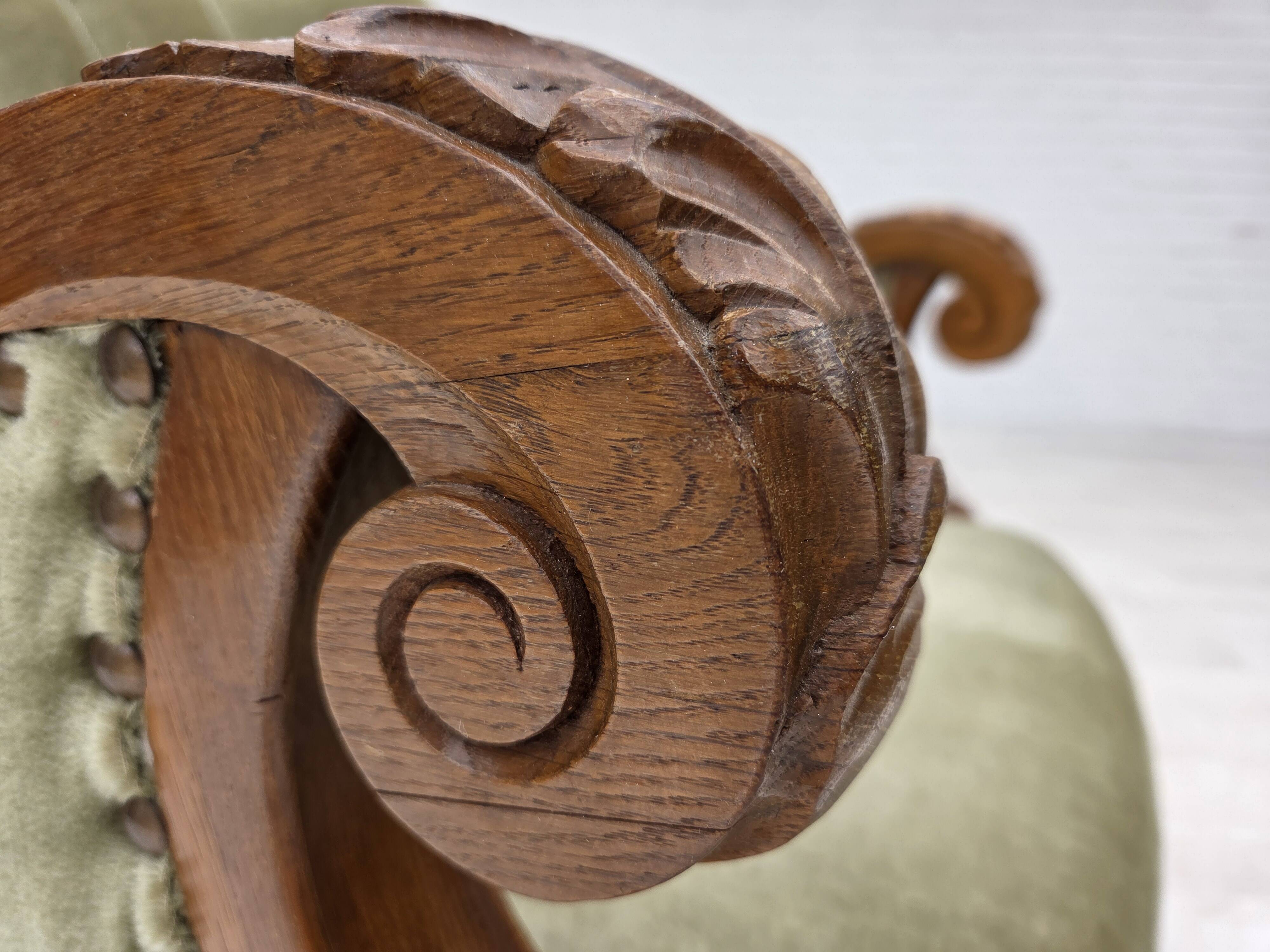 1960s, Danish armchair, green furniture velour, carved oak wood.