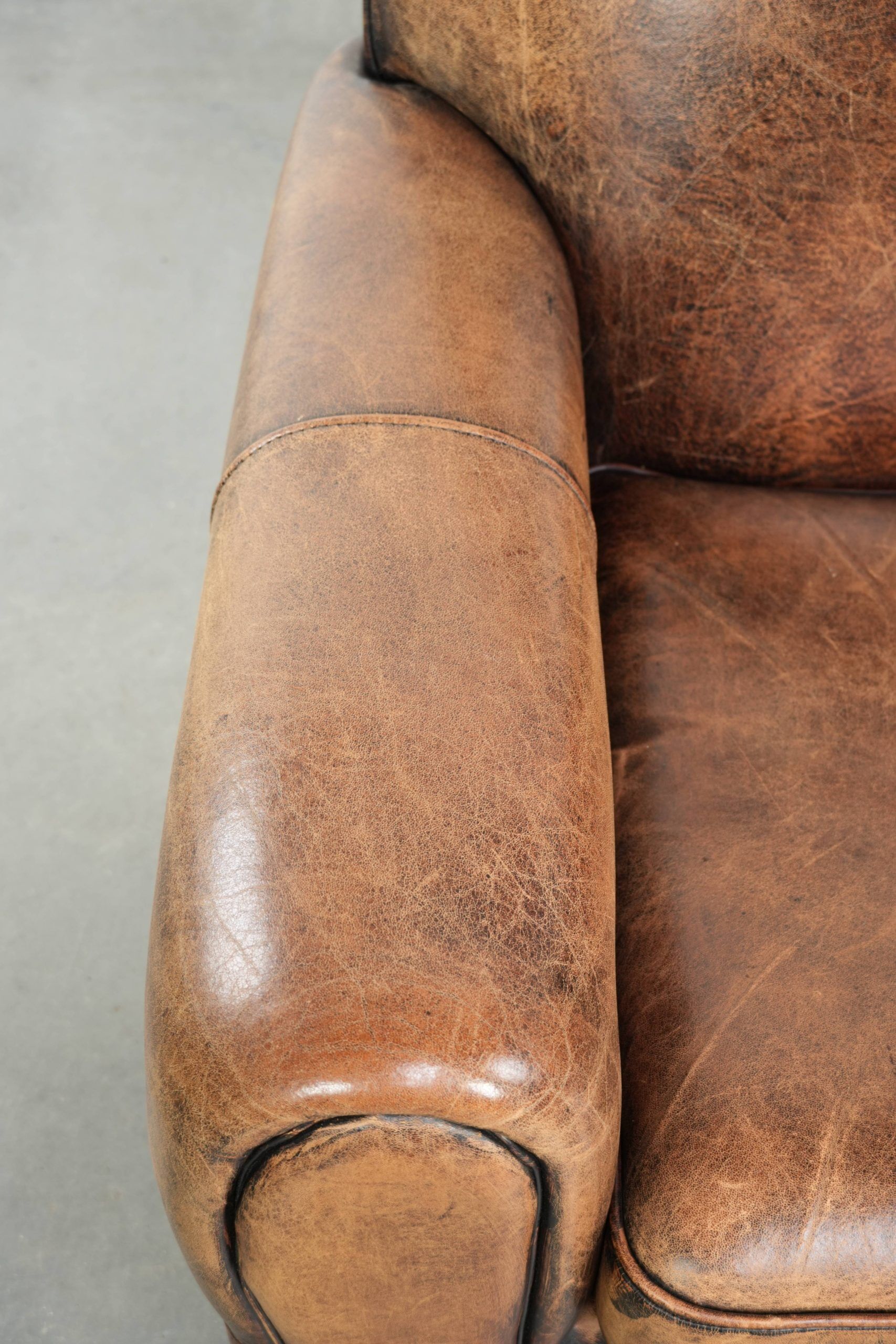 Armchair made of sheepskin leather in Art Deco design with beautiful patina