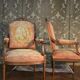 Paire de fauteuils de style Louis XVI en noyer