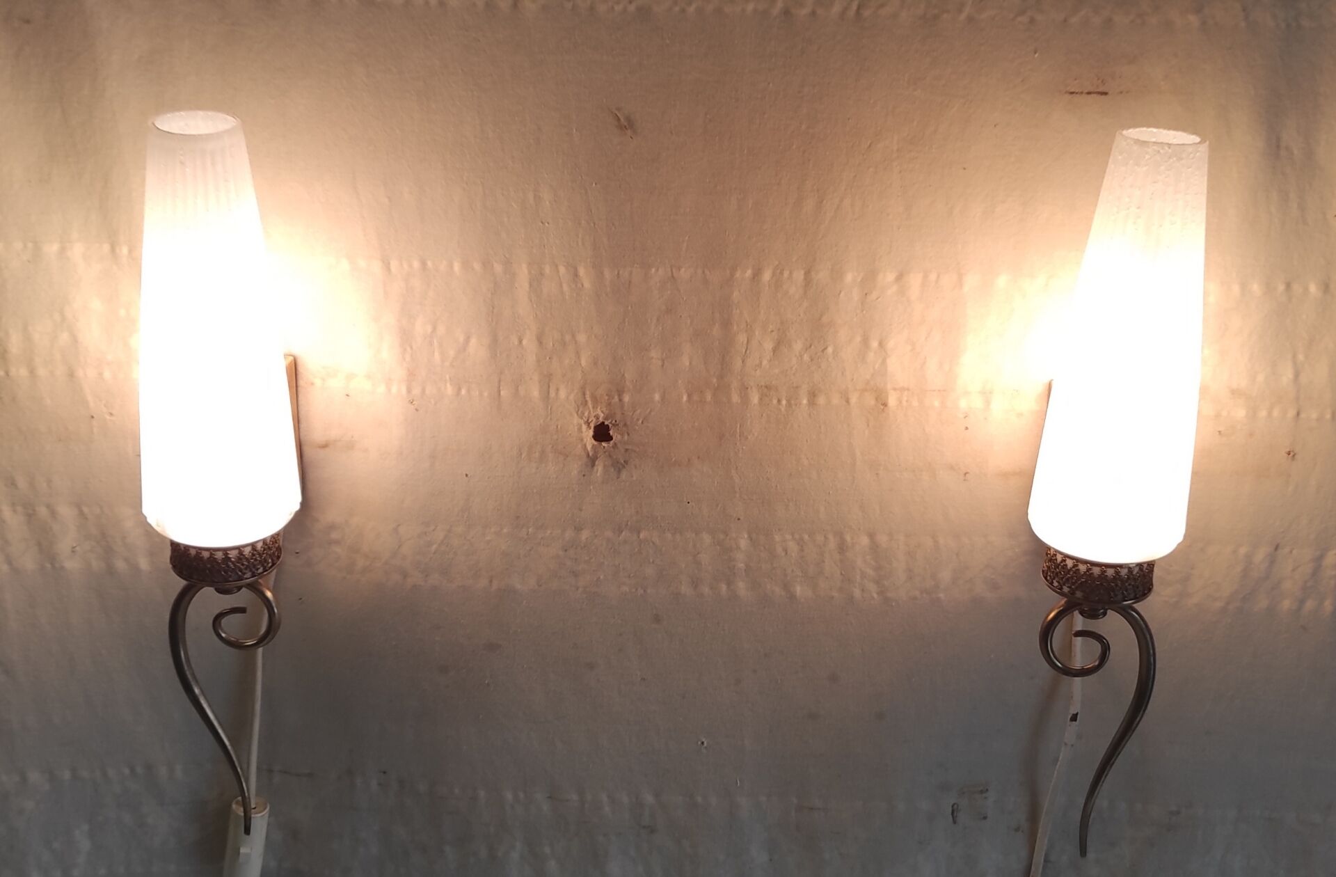 Modernist wall lights in brass and opaline - mid 20th century.