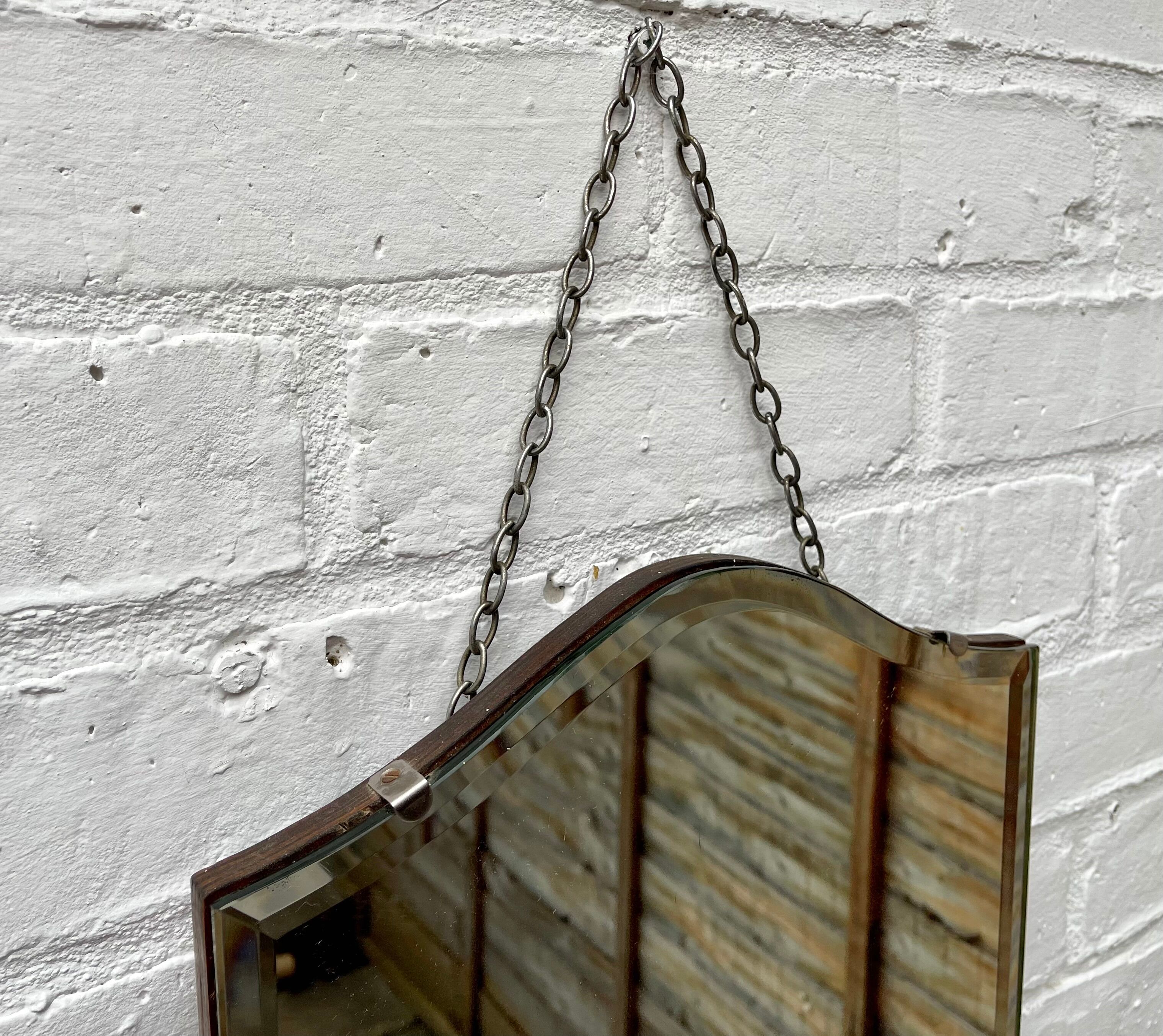 Vintage wall mirror with bevelled glass