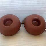 Pair of matte brown ceramic cellar rat candlesticks
