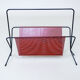 Fifties perforated metal magazine rack