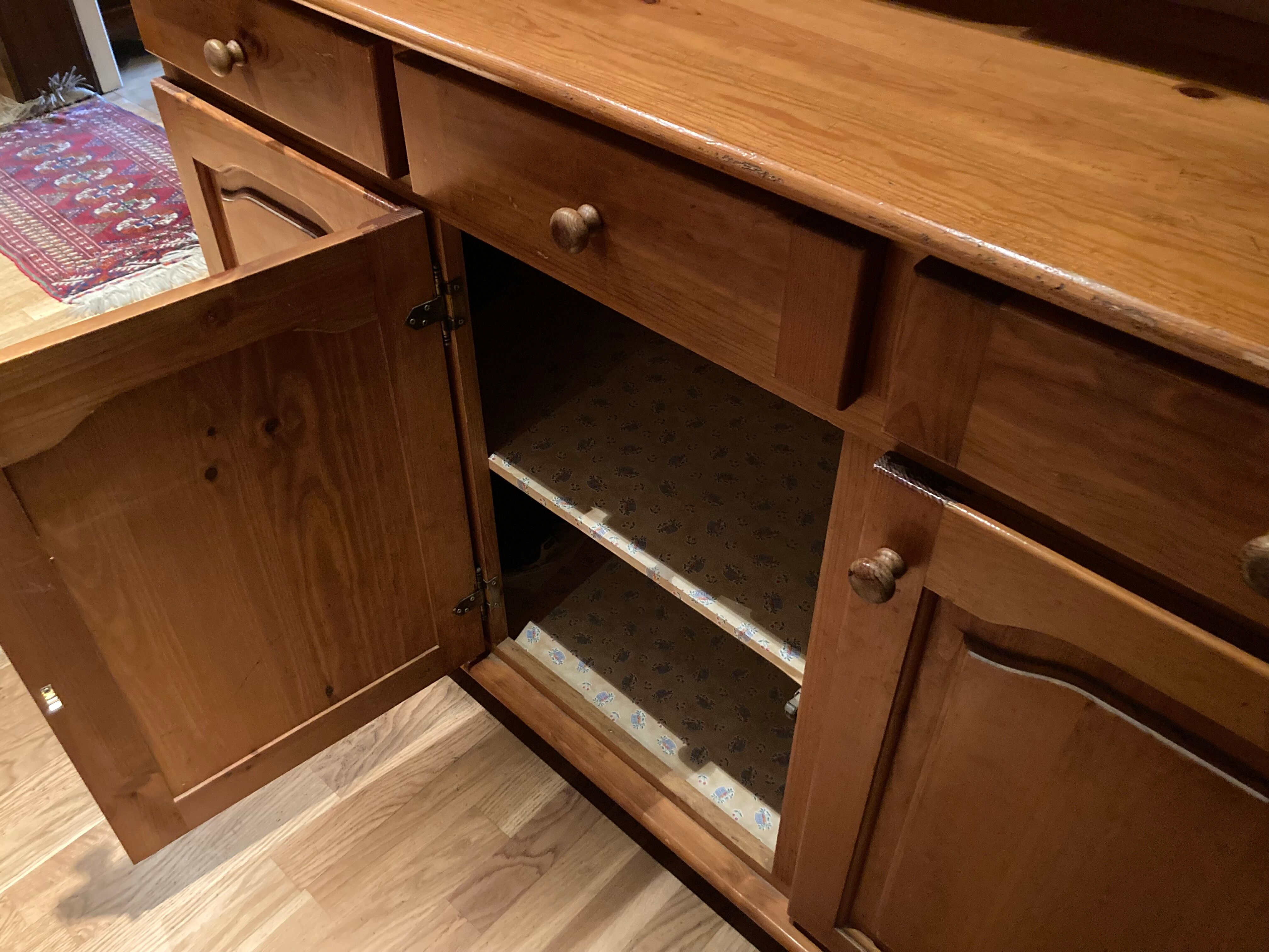 Honey-colored varnished pine vessel