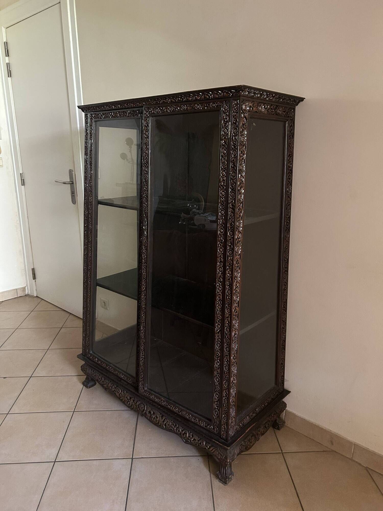 Thai trapezoidal display cabinet in carved solid wood