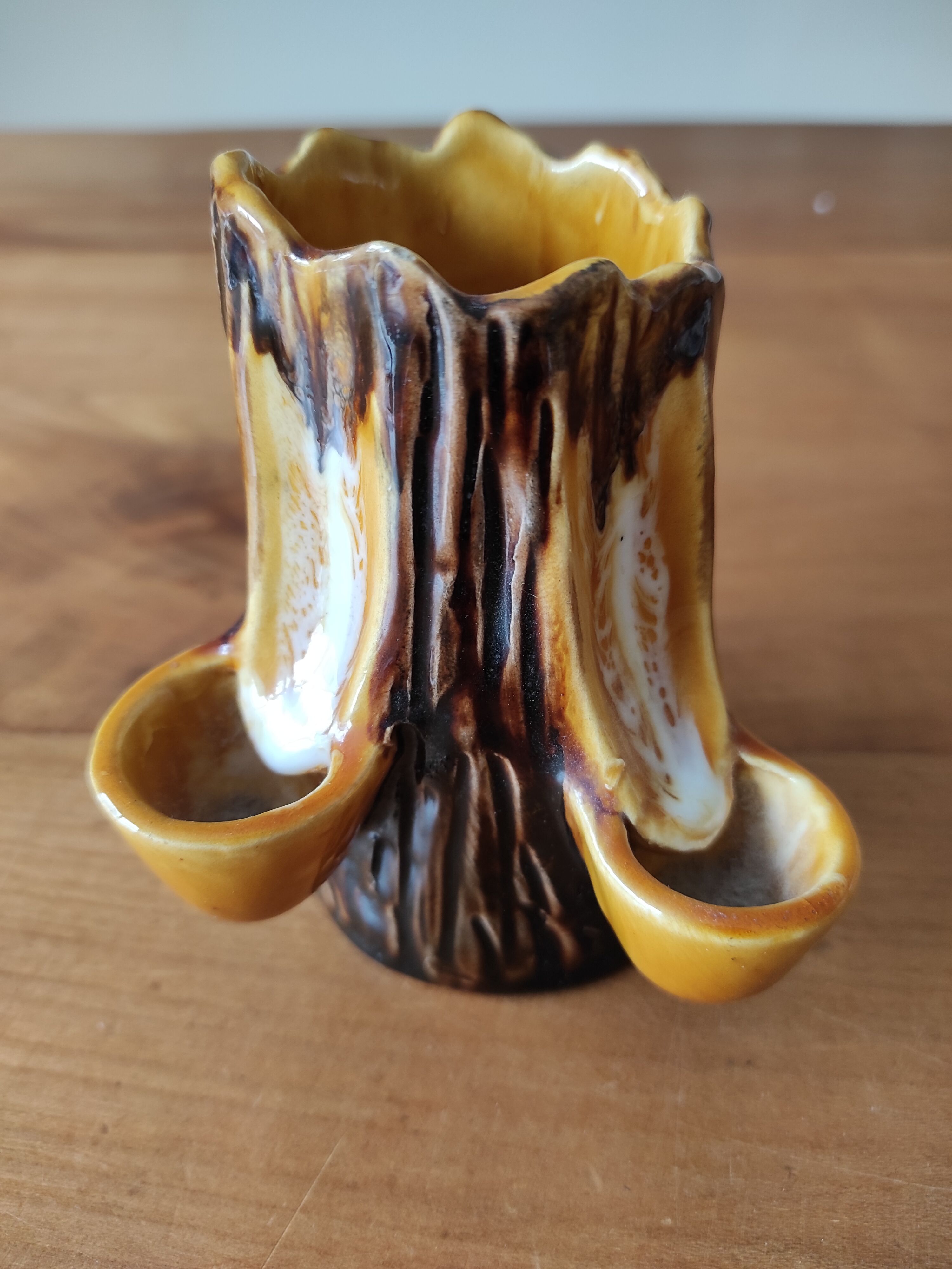 Ceramic vase with tree trunk decoration