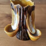 Ceramic vase with tree trunk decoration