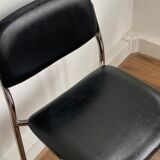 Lots of black chairs design