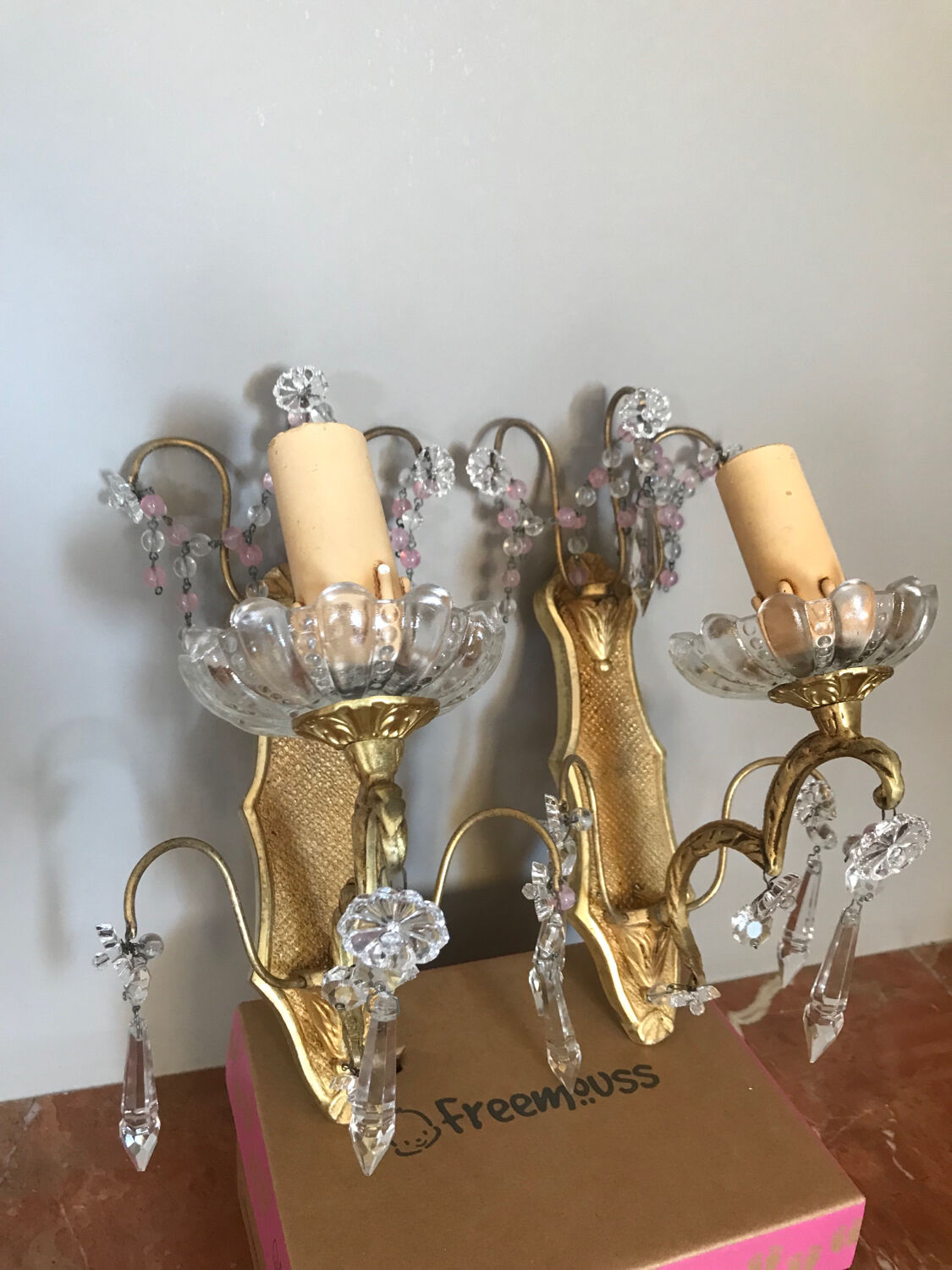 Pair of glass wall sconces with crystal drops