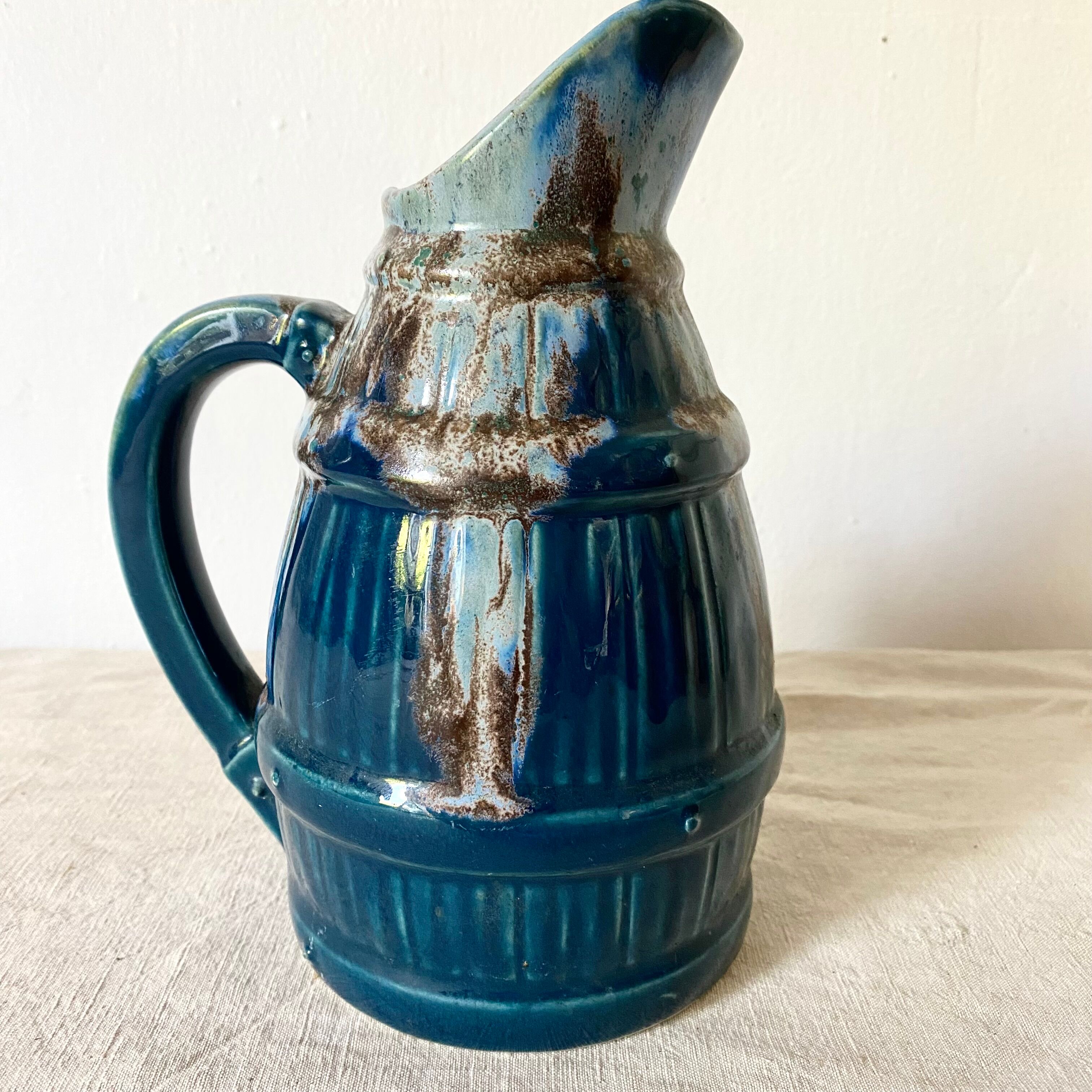 Blue barrel ceramic pitcher