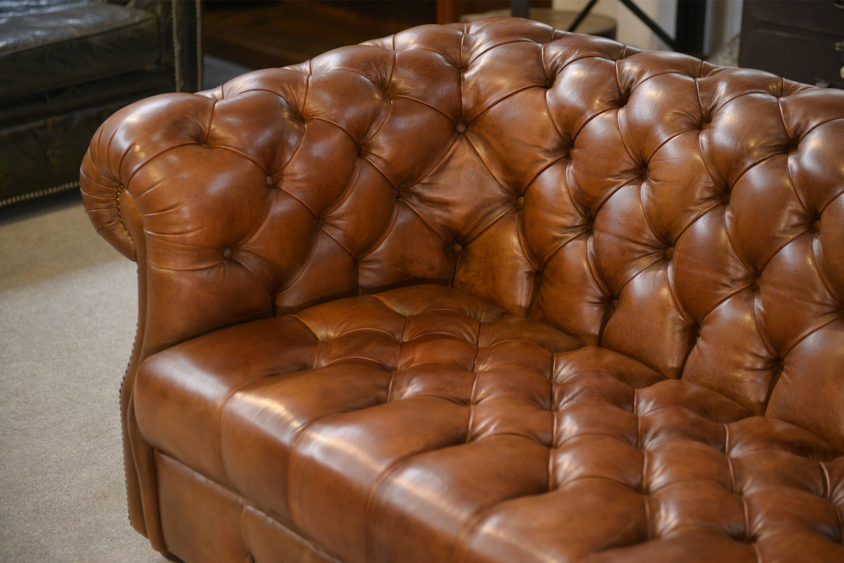 Tan leather tufted Chesterfield sofa