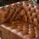 Tan leather tufted Chesterfield sofa