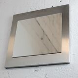 Miroir "space age". Acier inoxydable. France, circa 1970