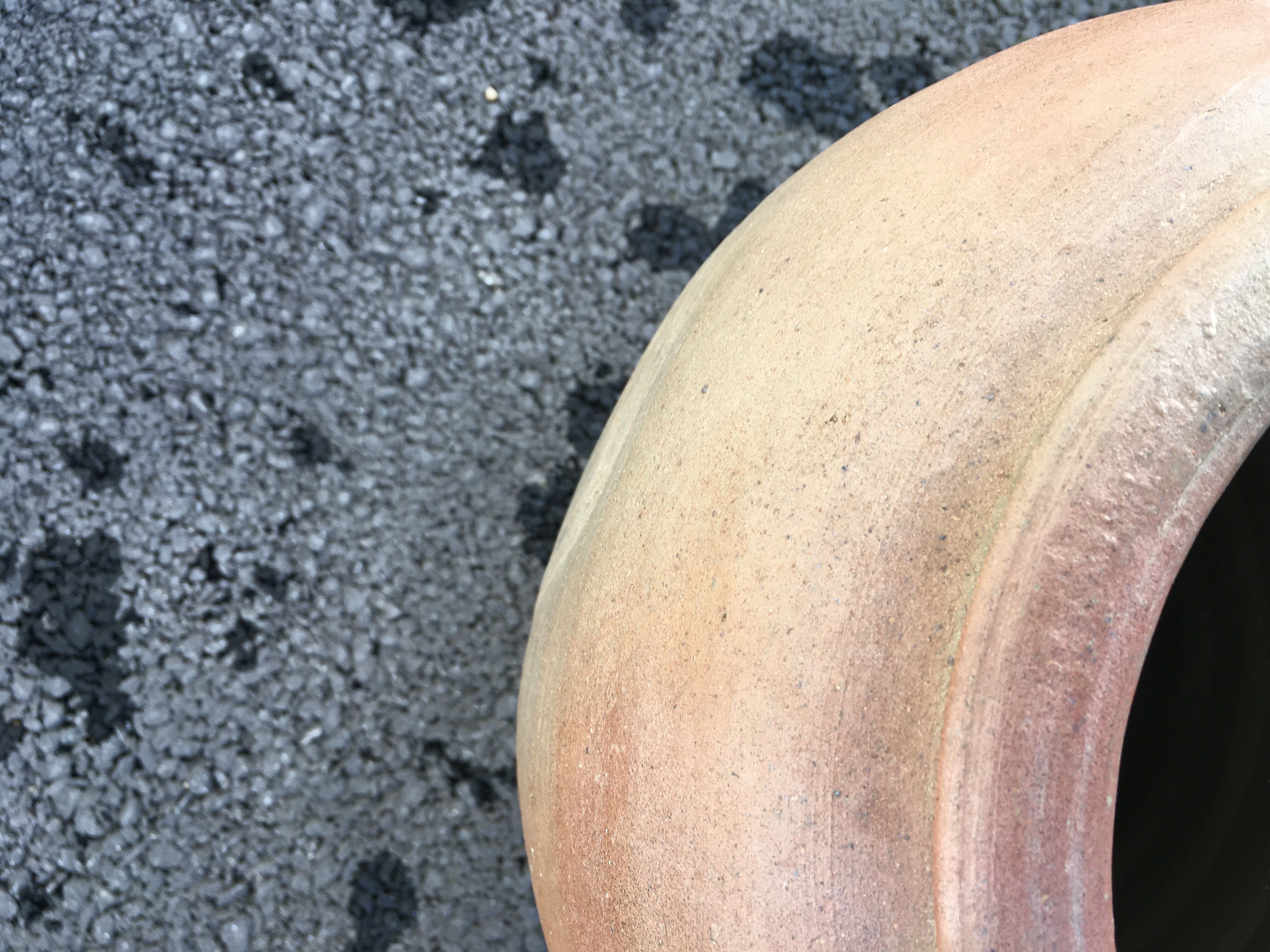 Old jug with two sandstone handles