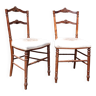 Paire de chaises volantes avec assise tapissée