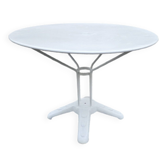 Old iron garden table and cast iron foot