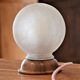 White glass globe table lamp with geometric reliefs