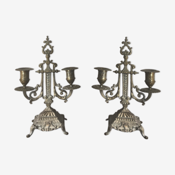 2 gold metal candlesticks