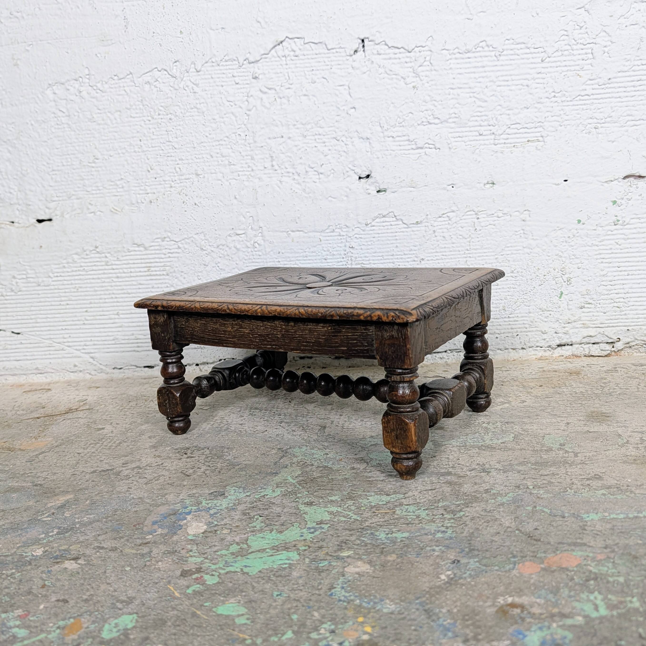 Carved wooden footrest