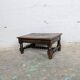 Carved wooden footrest