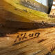 Carved and painted wooden Alpine panel signed 18 / 26 cm