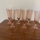 Champagne flutes in pink glass from Arcoroc Luminarc model Rosaline.