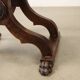 Antique neo-Renaissance folding chair in walnut and leather, Italy, 20th century.