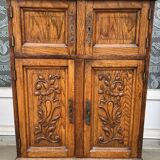 Low carved wooden sideboard