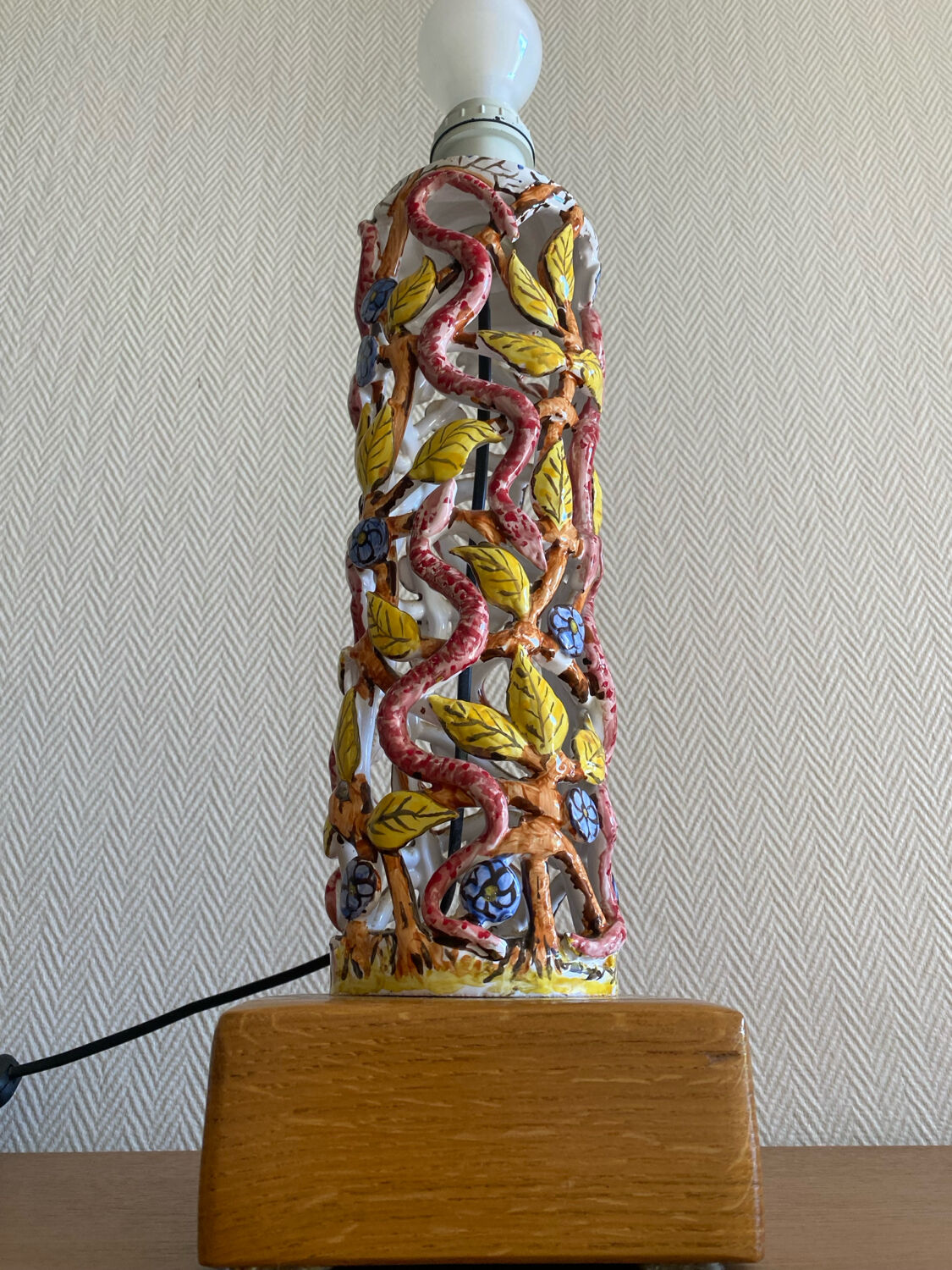 Openwork ceramic lamp base with Garden of Eden decor